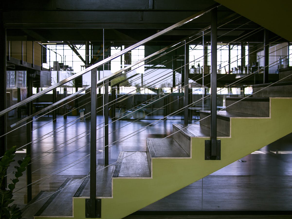 Custom steel cable railing system on staircase
